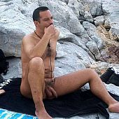 Stripped guys on the nudist beach.